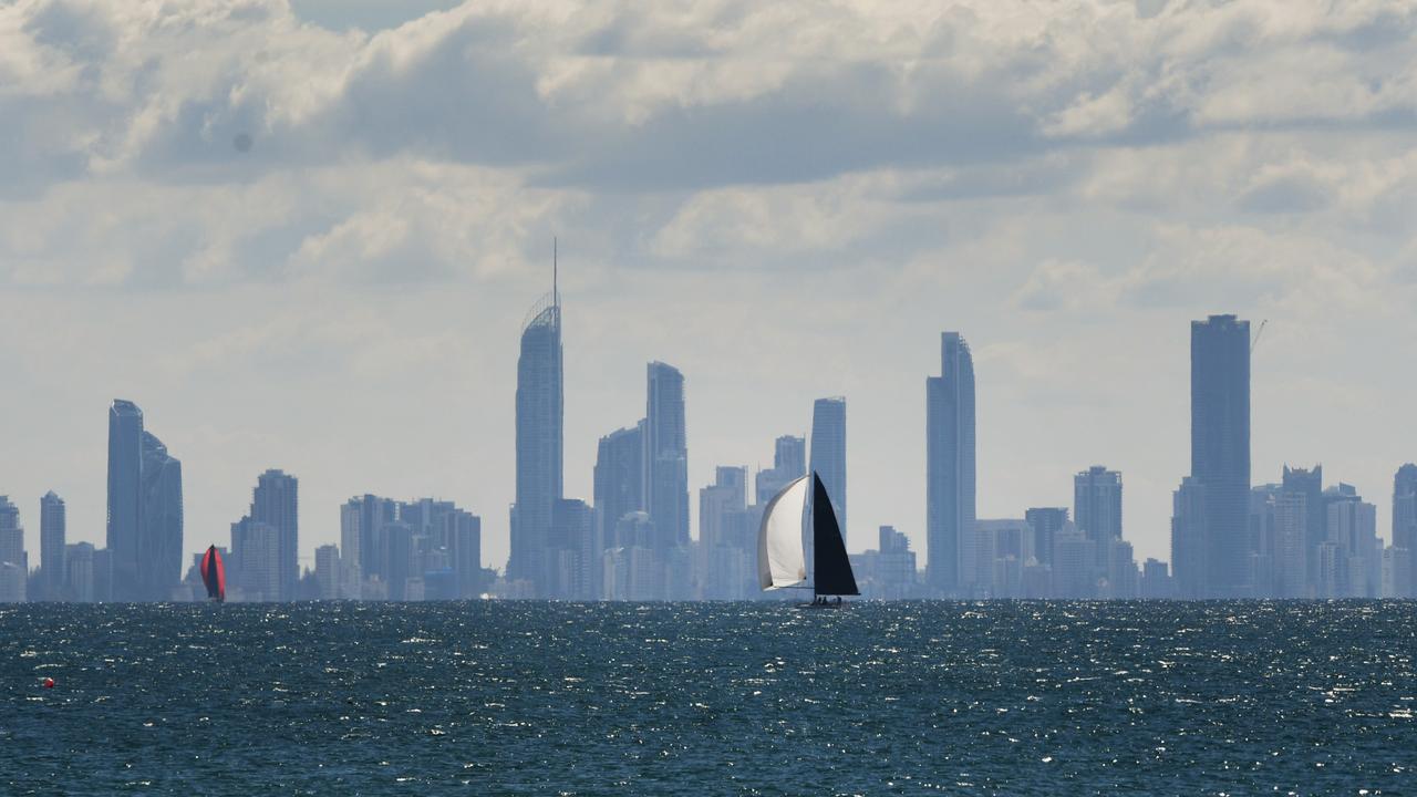 A sailboat along the city skyline on the Gold Coast, Queensland