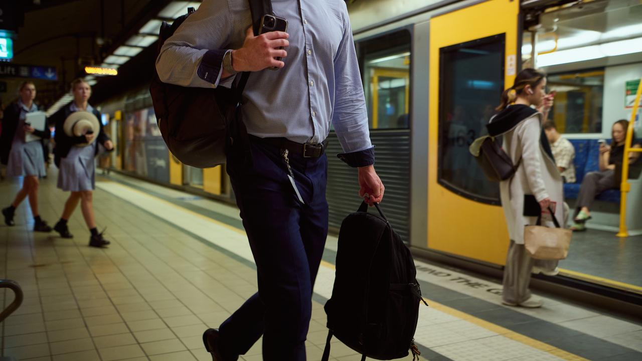 People board a train at Sydney (file image)