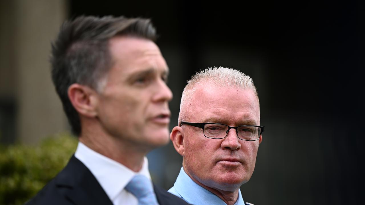 Premier Chris Minns and NSW Police Commissioner Mal Lanyon (right)