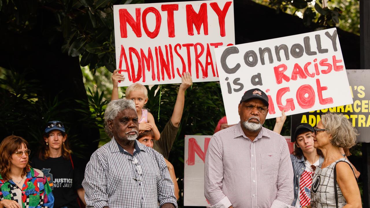 People participate in a protest in the NT