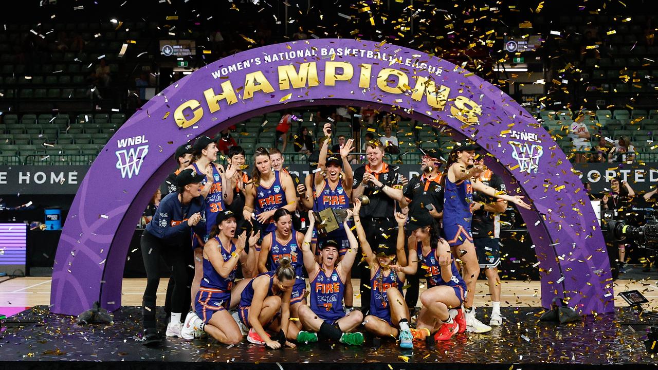 Townsville Fire players celebrating.