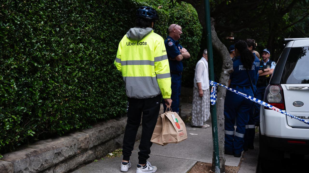 Police and paramedics at the scene of the shooting in Potts Point