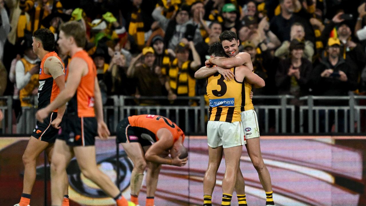 Celebrating Hawthorn players.