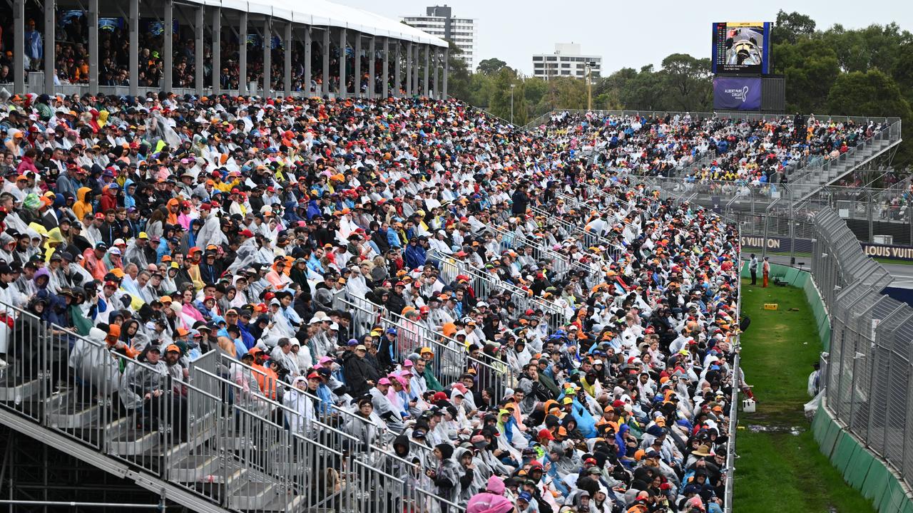 A huge crowd watches  the Australian Formula One Grand Prix
