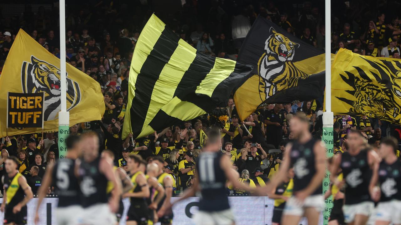 Tiger fans celebrate last year's victory over Carlton.