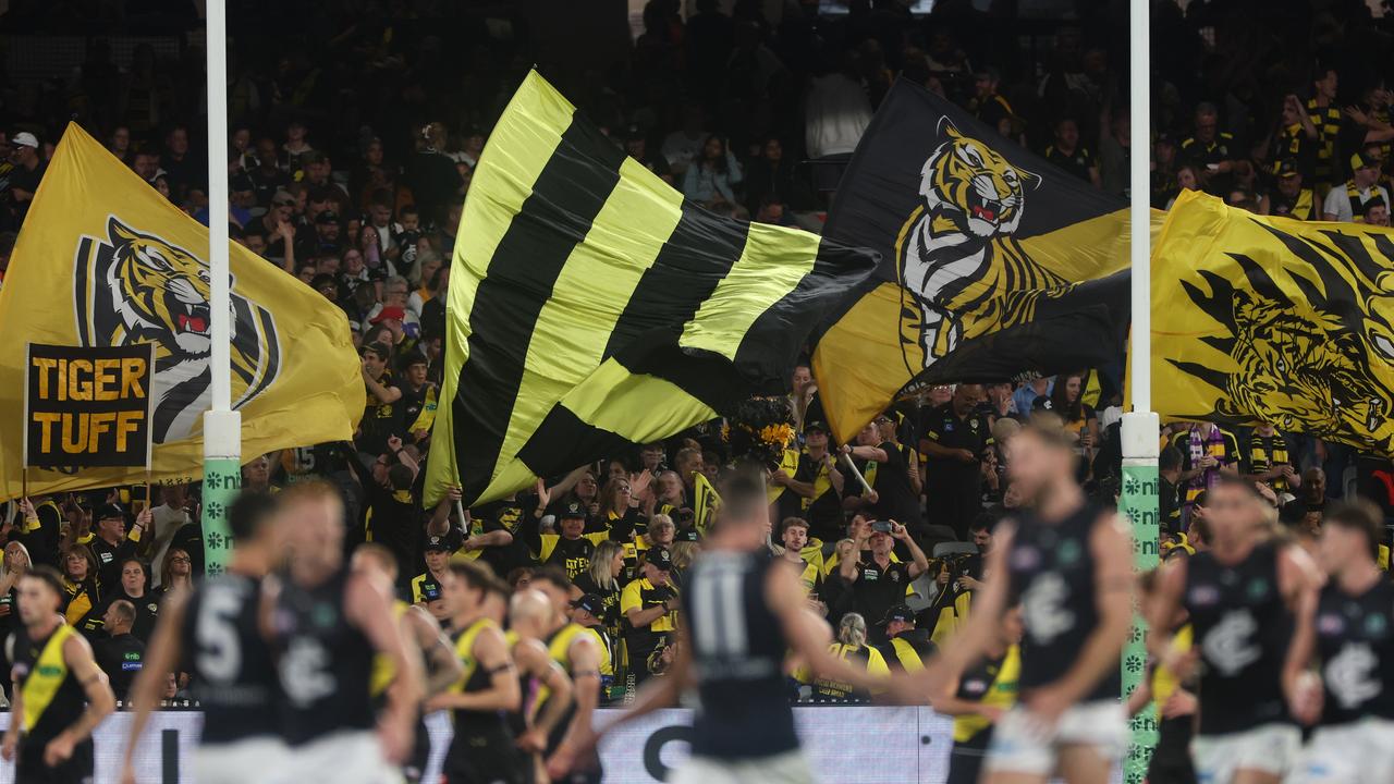 Tigers fans celebrate against Carlton