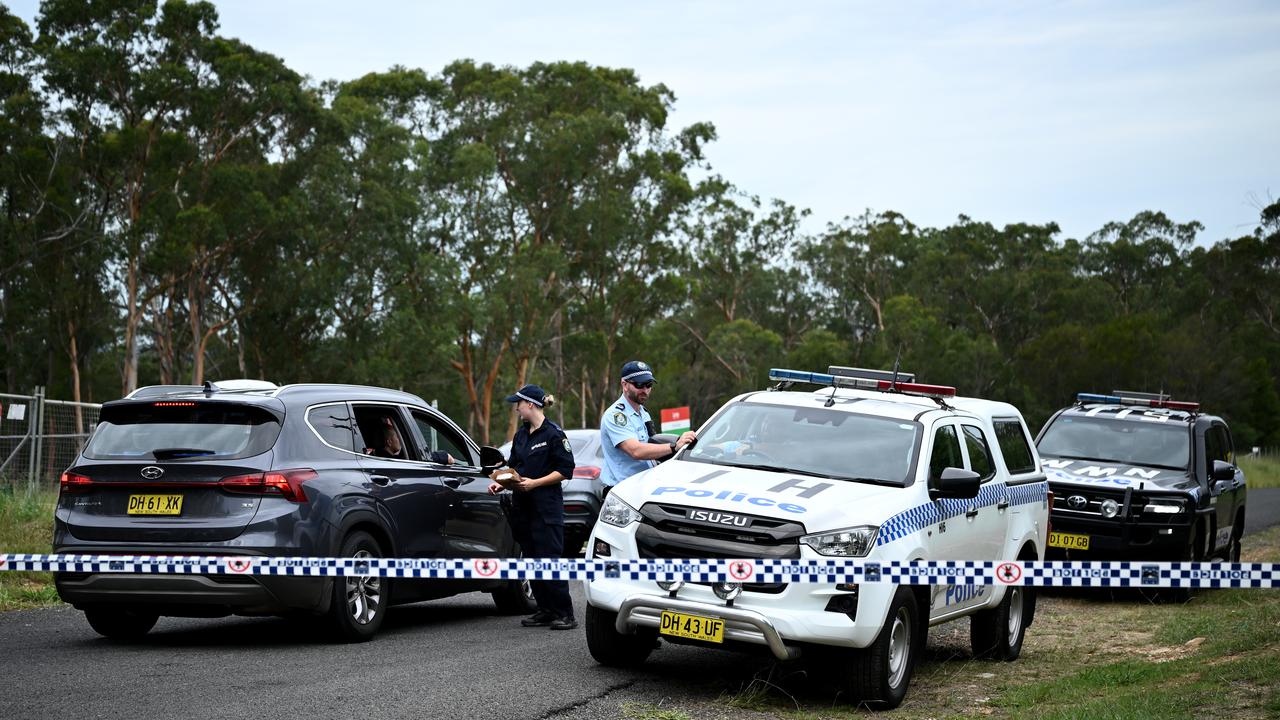 Police search a property