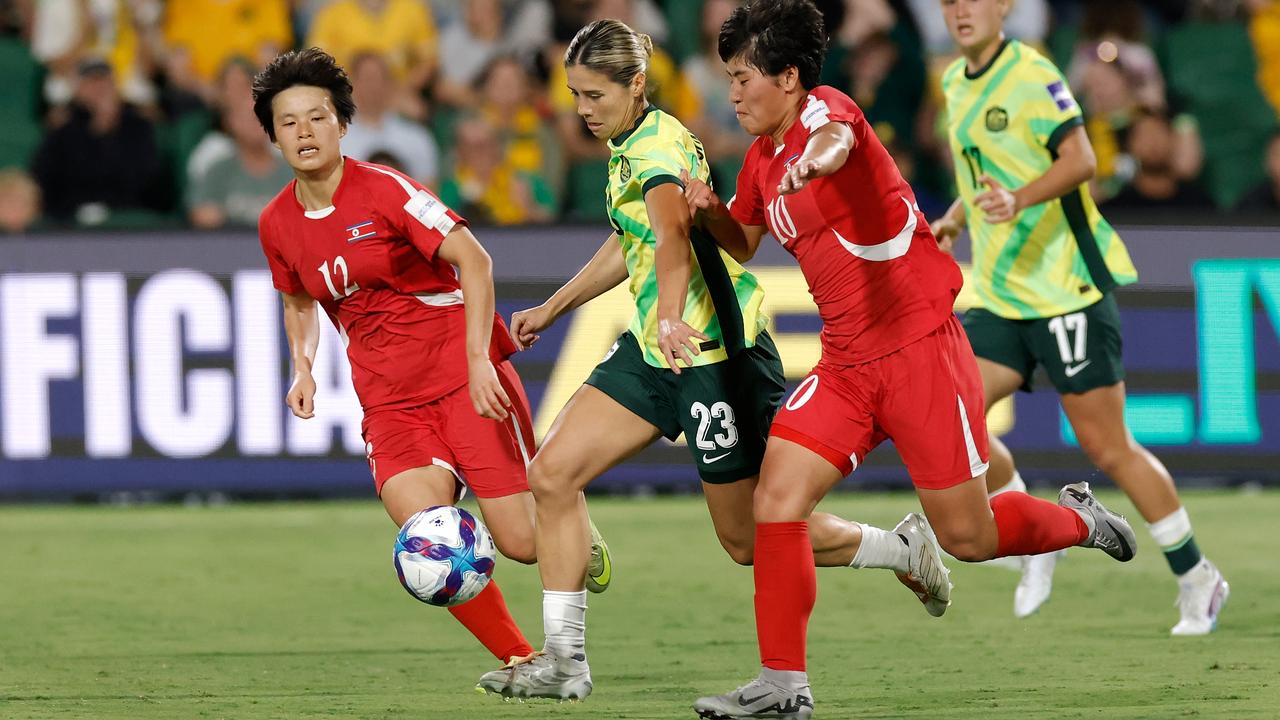 Kyra Cooney-Cross of Australia under pressure from North Korea