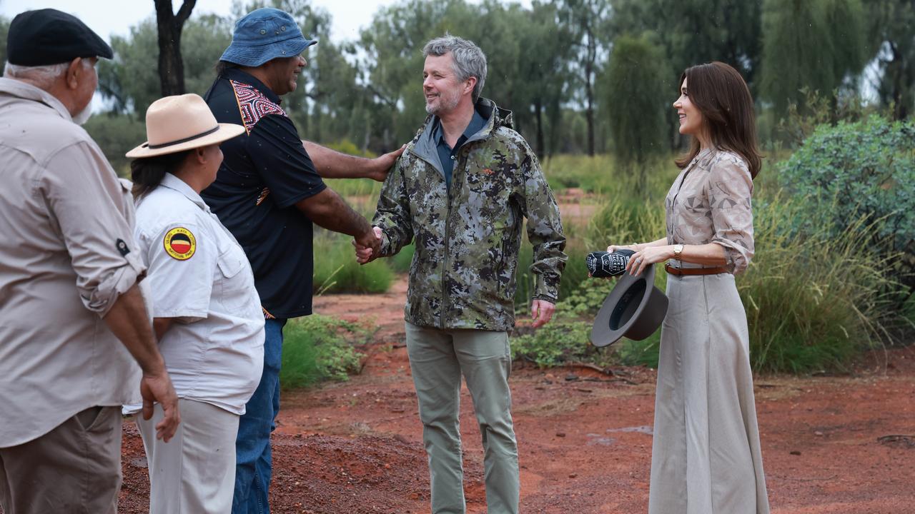 King Frederik and Queen Mary are greeted by Aboriginal elders at Uluru