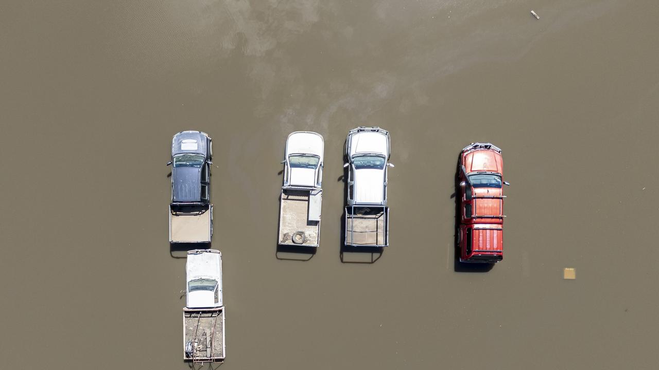 An aerial view shows submerged cars during flooding