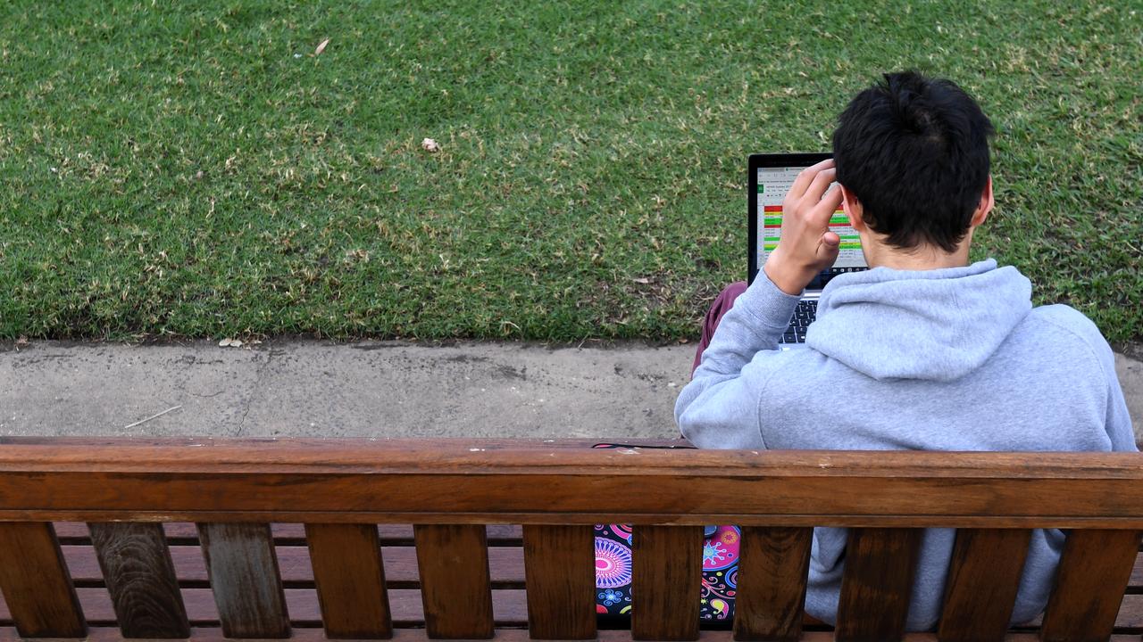 A student works on a laptop