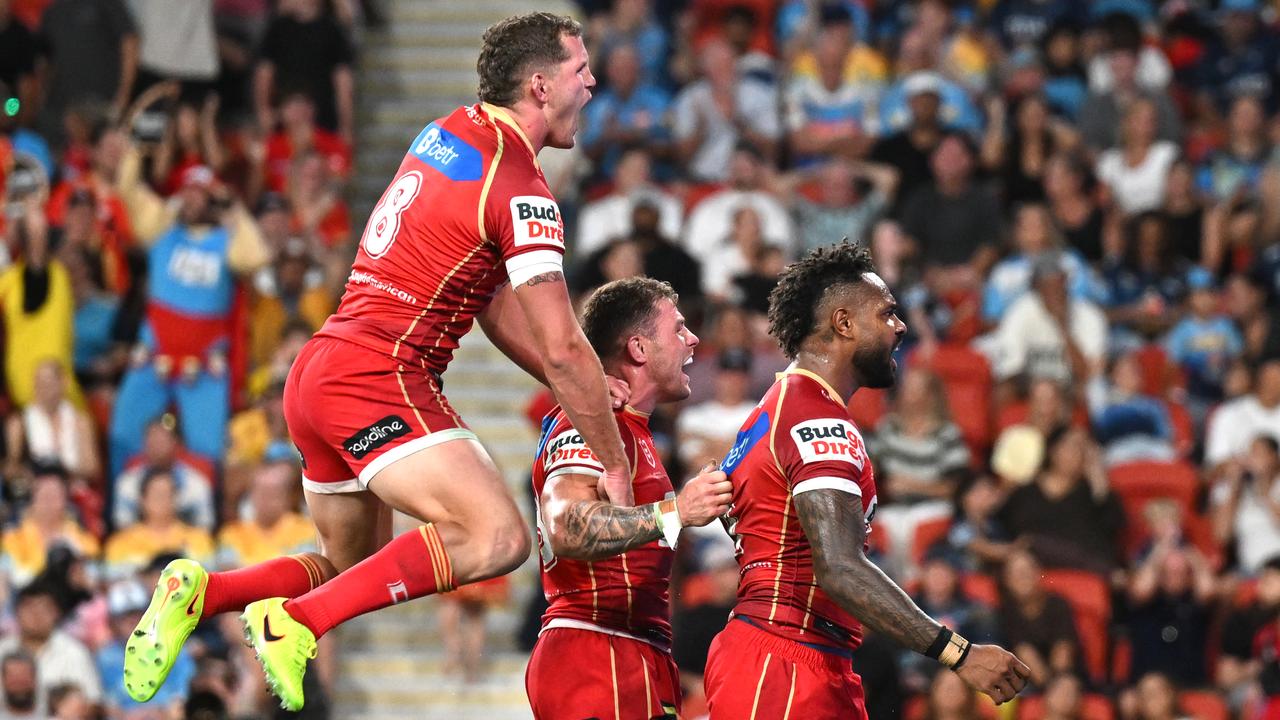 Celebrating Dolphins players.