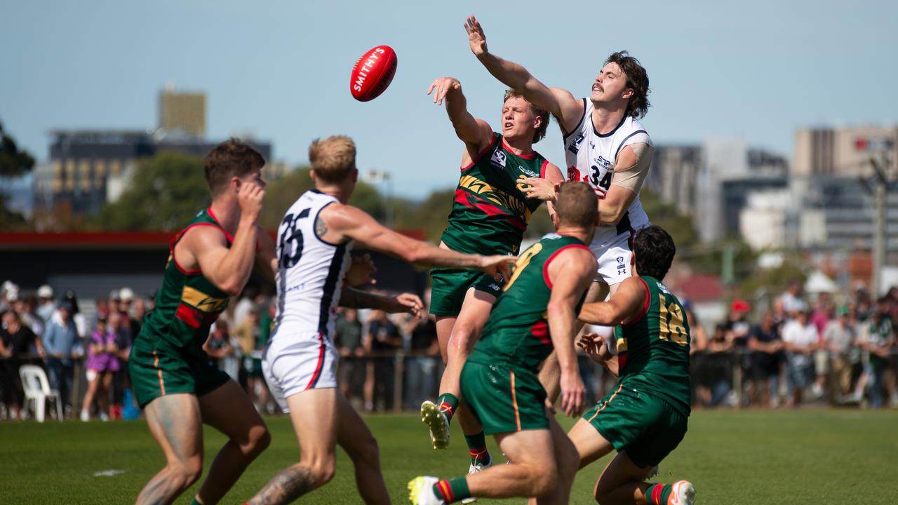 The Devils' Hugh Dixon and Coburg's Joe Furphy