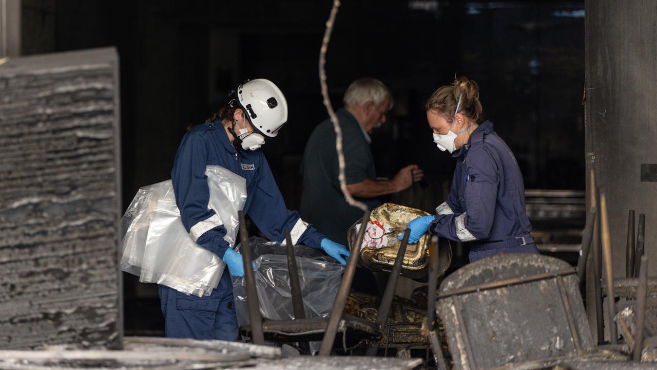 Forensic police at a shop fire (file image)