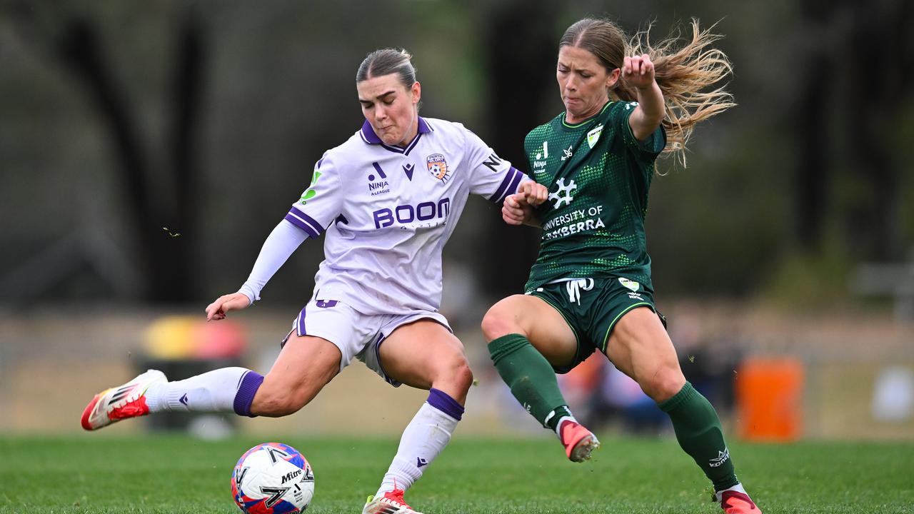 A late goal by Canberra's Emma Hawkins (right) 