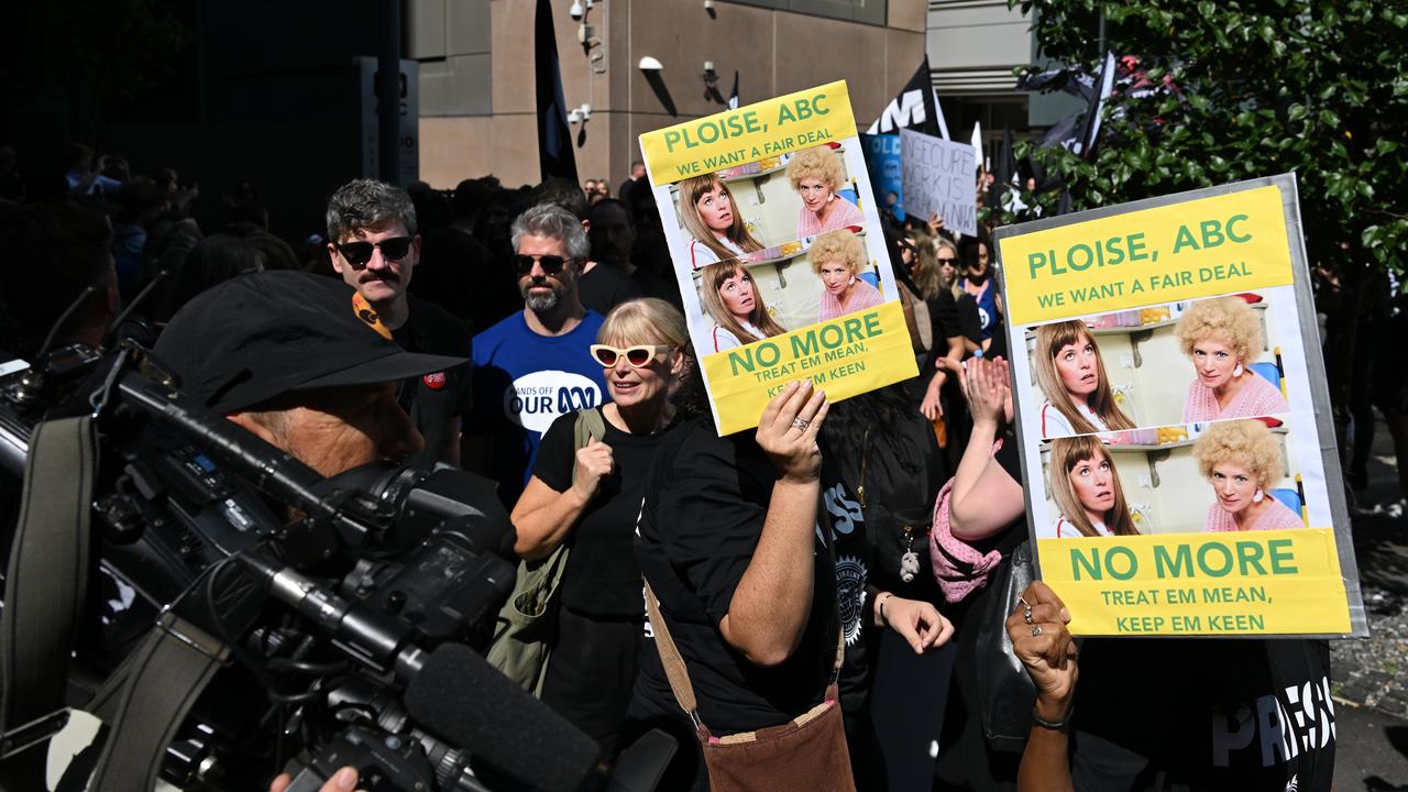 ABC staff with protest signs