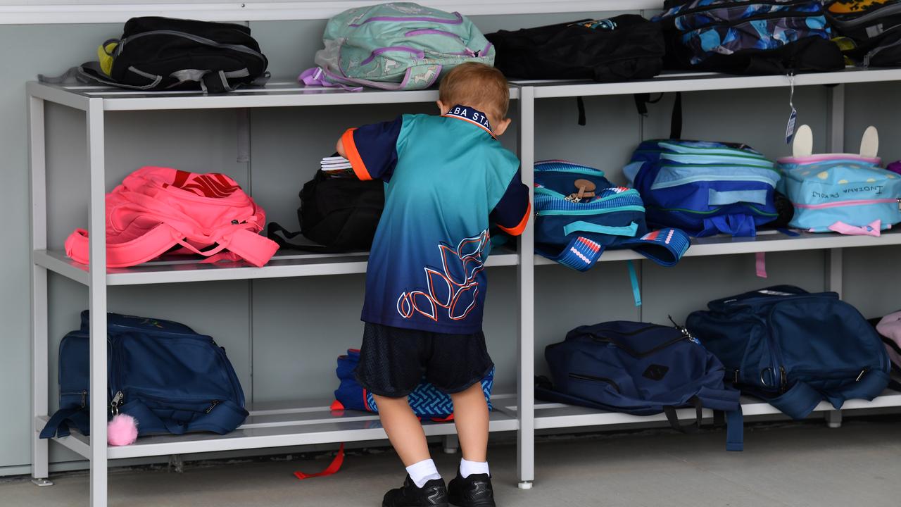 A student at his school bag at a primary school in Logan City