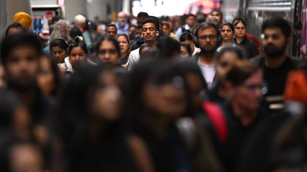 People are seen disembarking a train (file image)