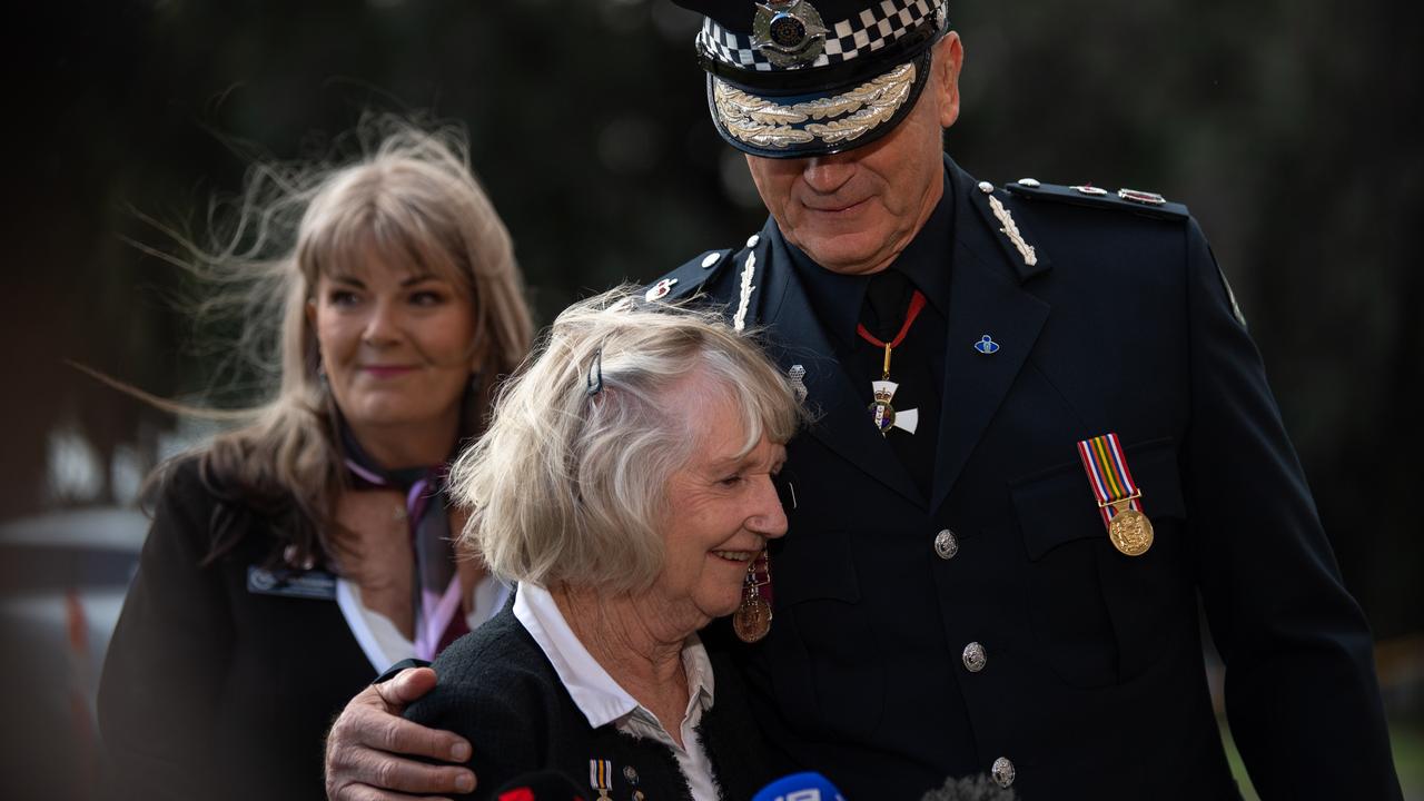 Mike Bush embraces Marilyn Taylor,