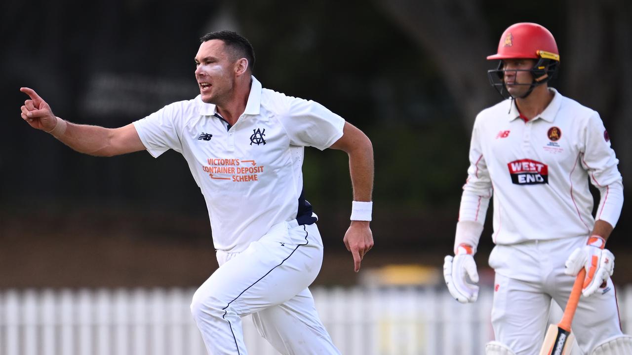 Alex Carey can only watch as Victoria's Scott Boland takes a wicket