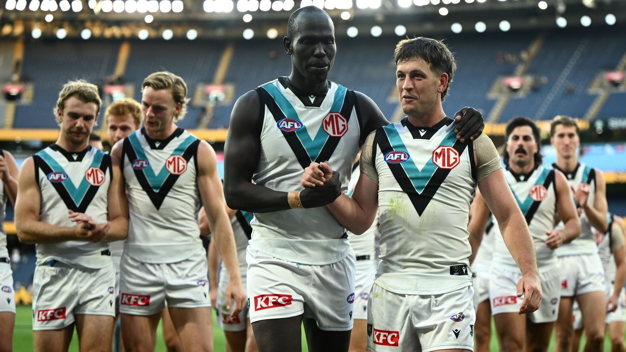 Defender Aliir Aliir and captain Zak Butters