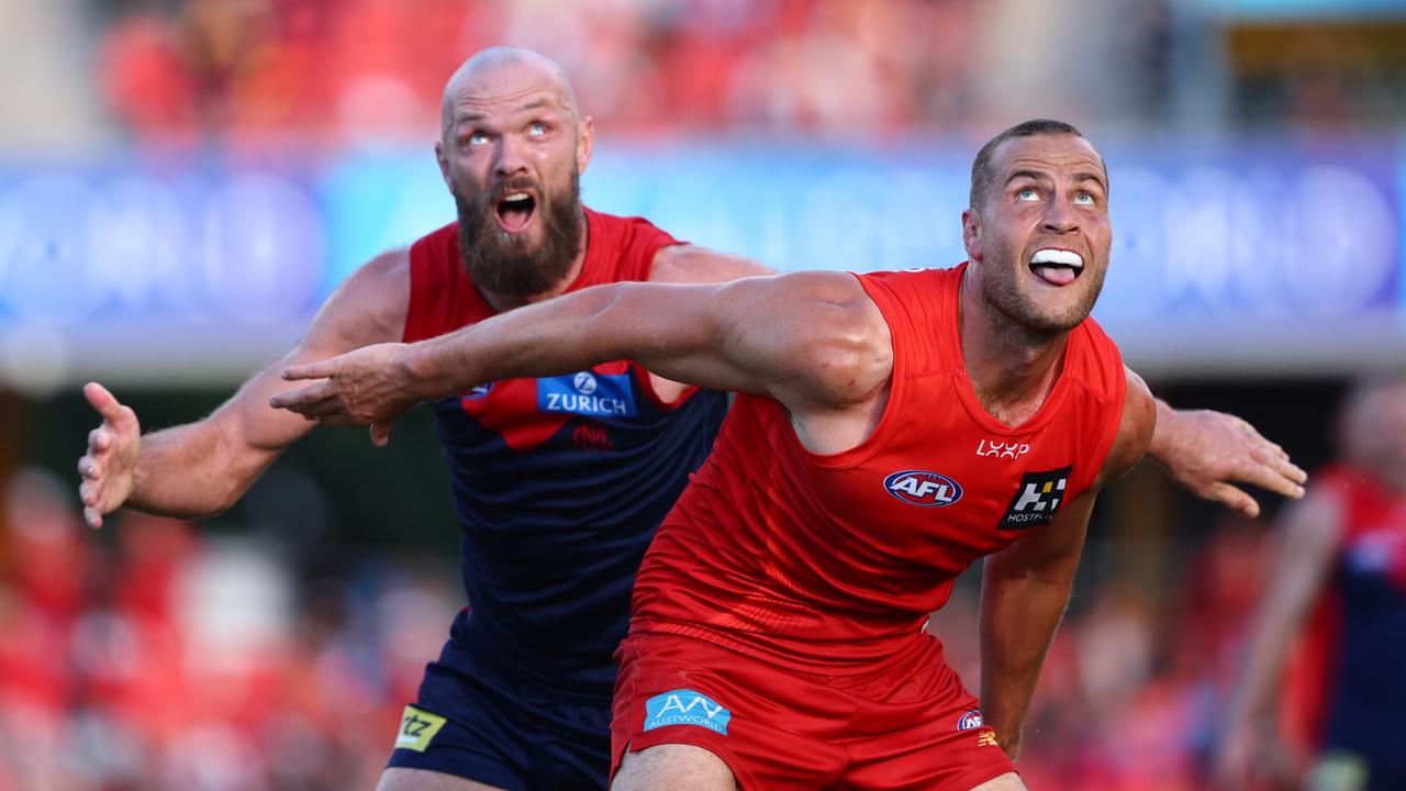 Jarrod Witts of the Suns battles with Max Gawn