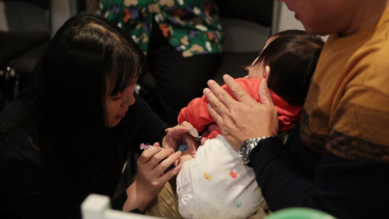 A baby gets a flu shot (file image)