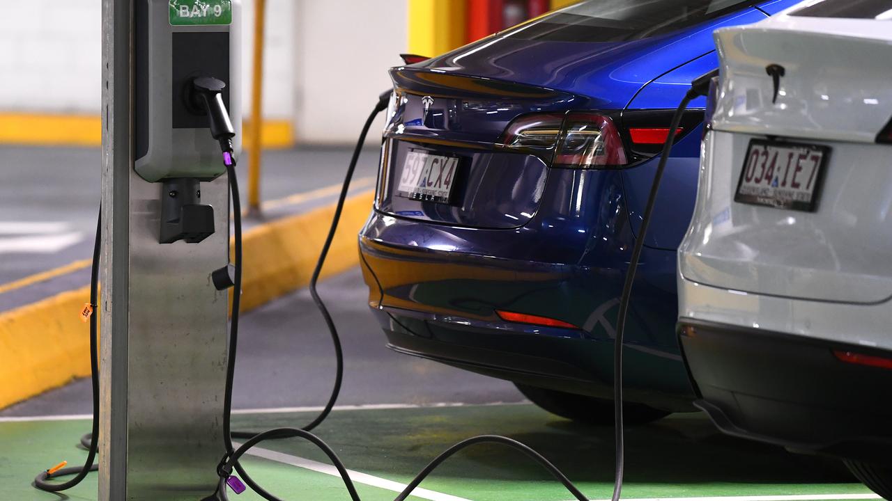 Electric vehicles being charged