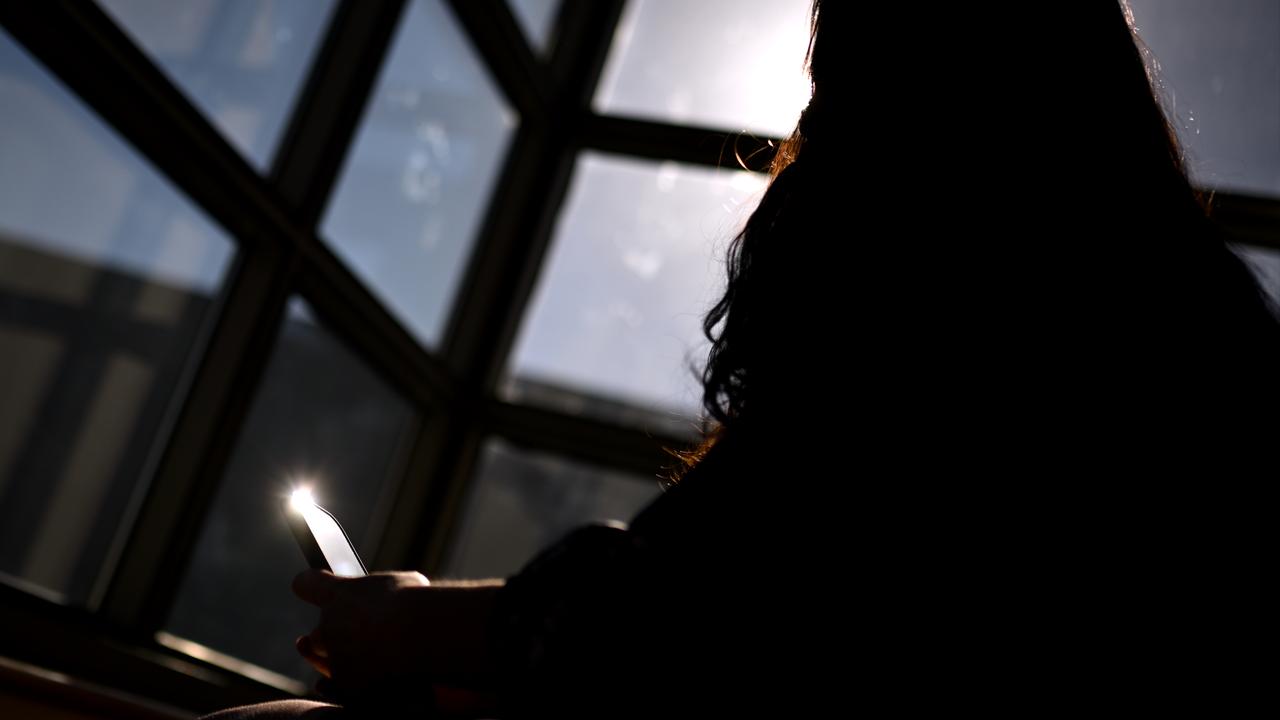 A woman on her mobile phone (file image)