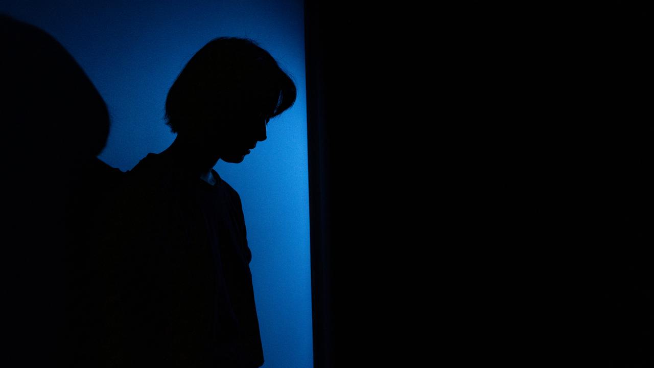 A person poses for a photograph (file image)