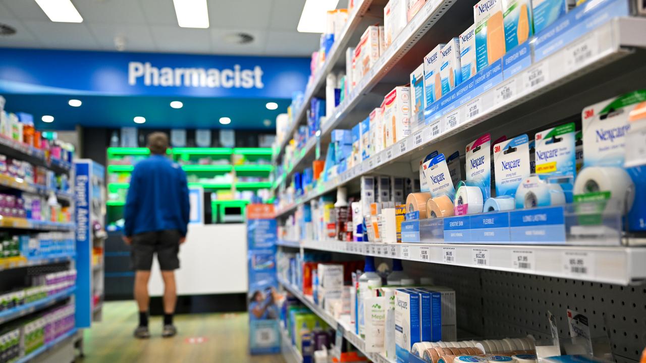 A customer waits at a counter at a pharmacy (file image)