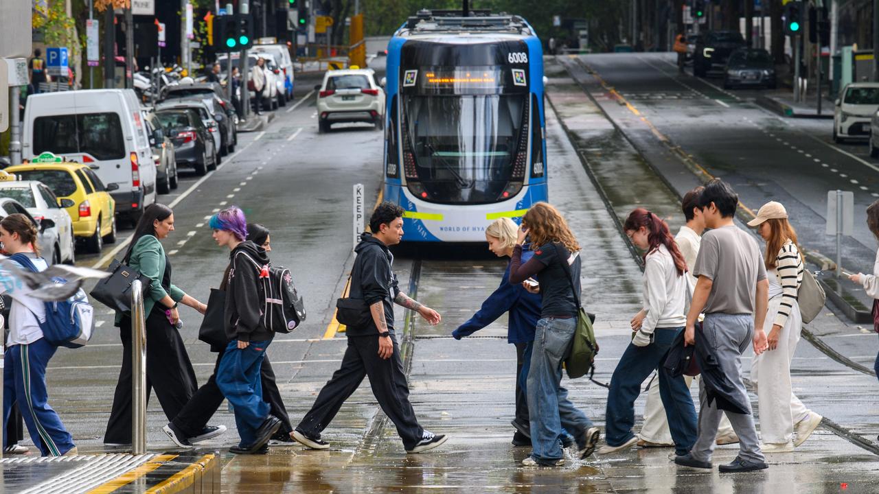 Rain fills tram tracks in the CBD in Melbourne