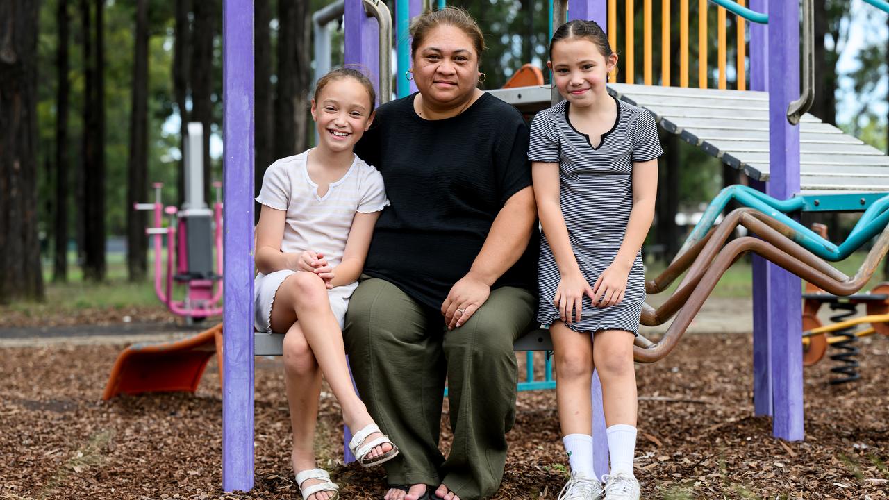 Tesa and her daughters at the park.