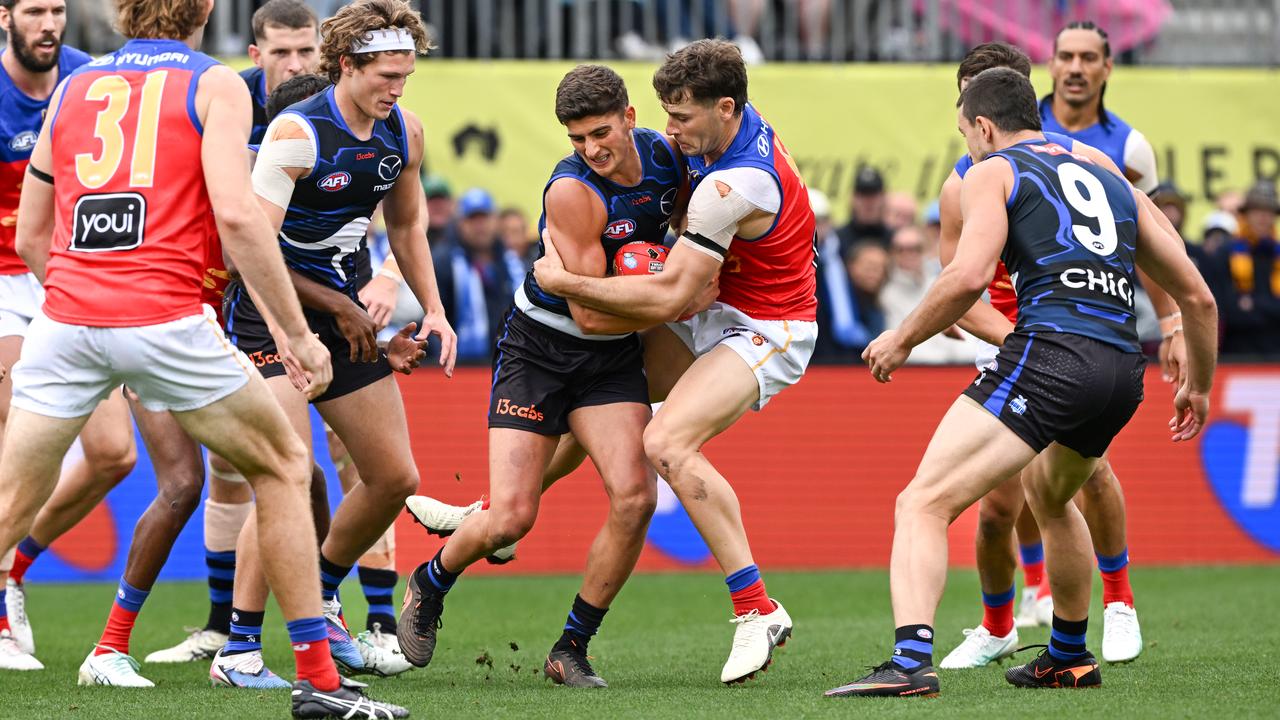 North Melbourne's Harry Sheezel and Brisbane's Josh Dunkley