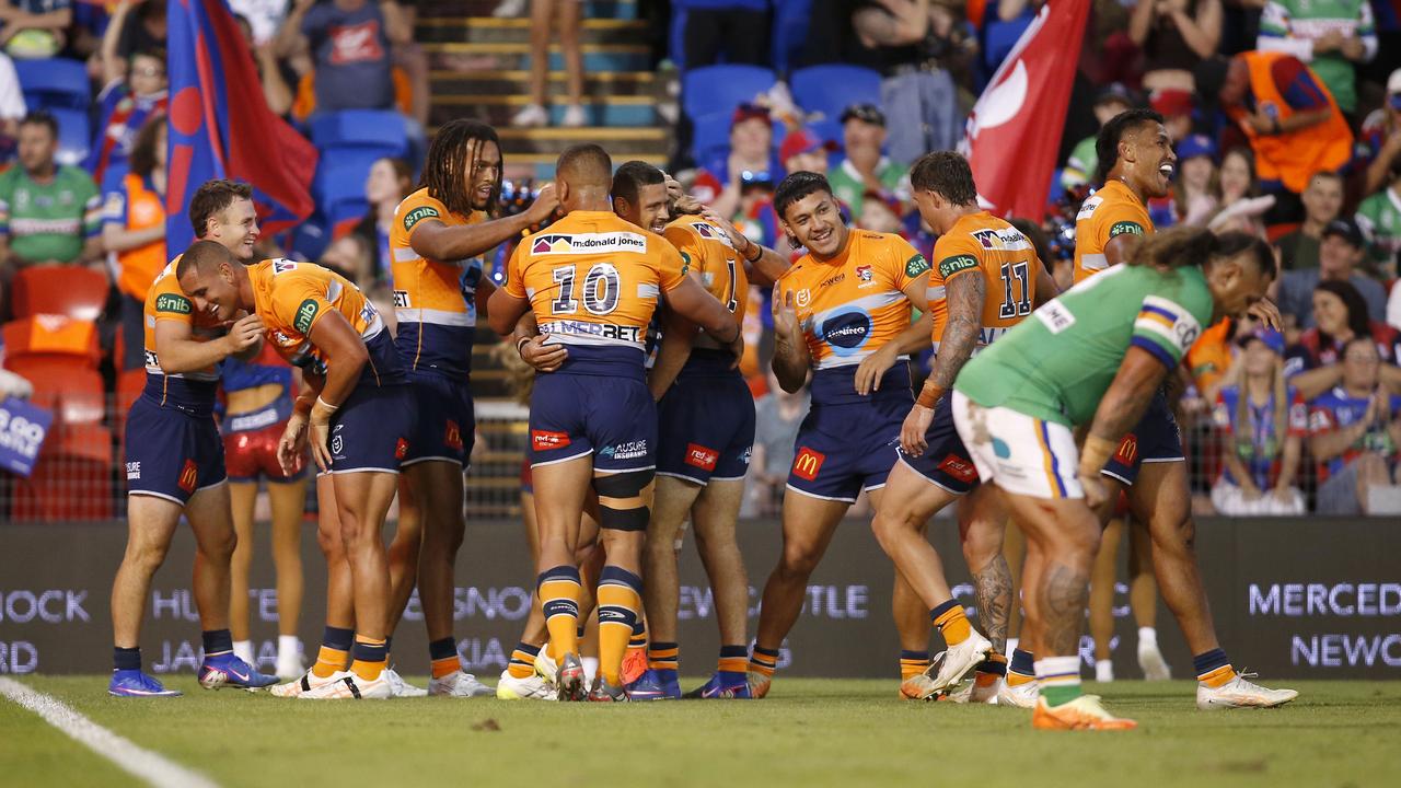 Newcastle celebrates after scoring against Canberra. 