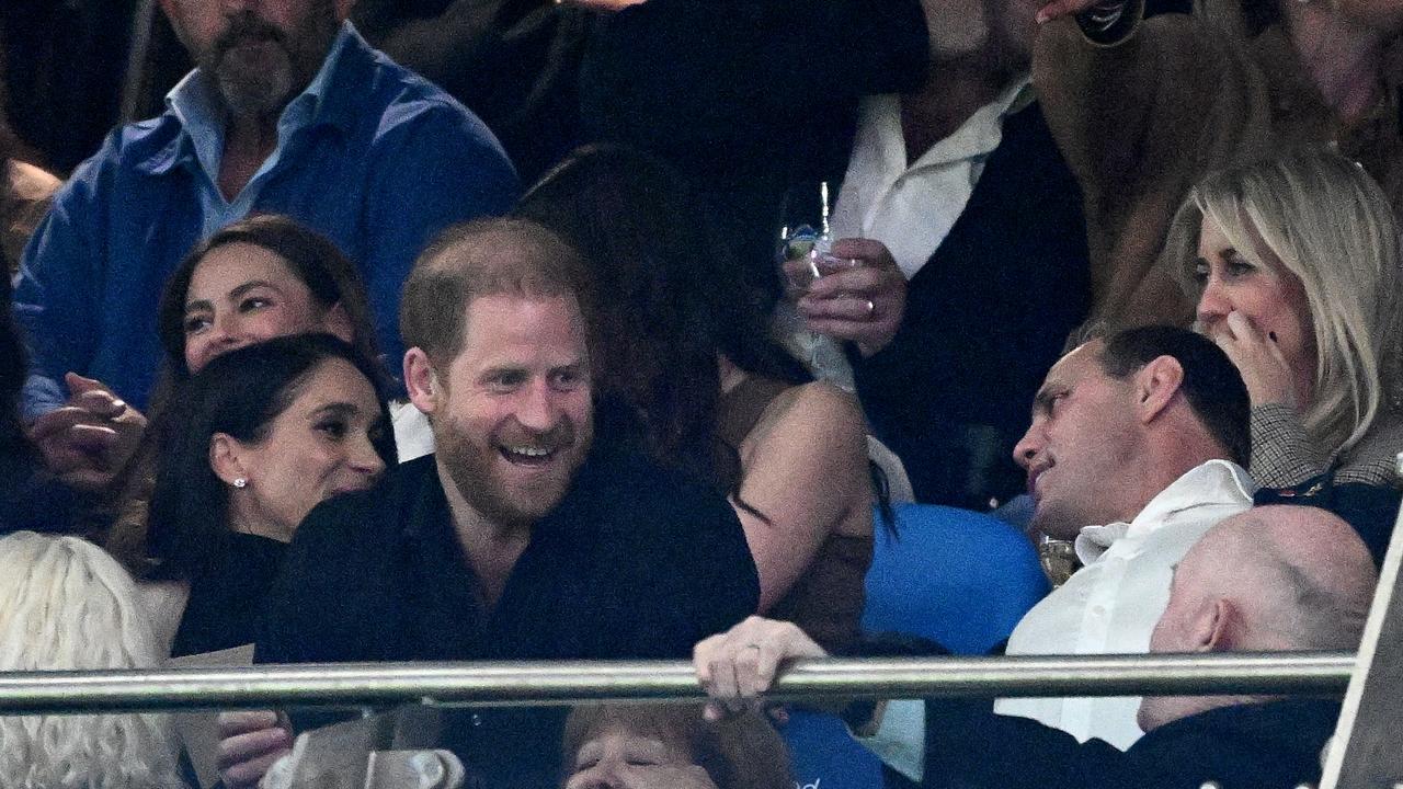 Prince Harry and Meghan speak with Rugby Australia CEO Phil Waugh