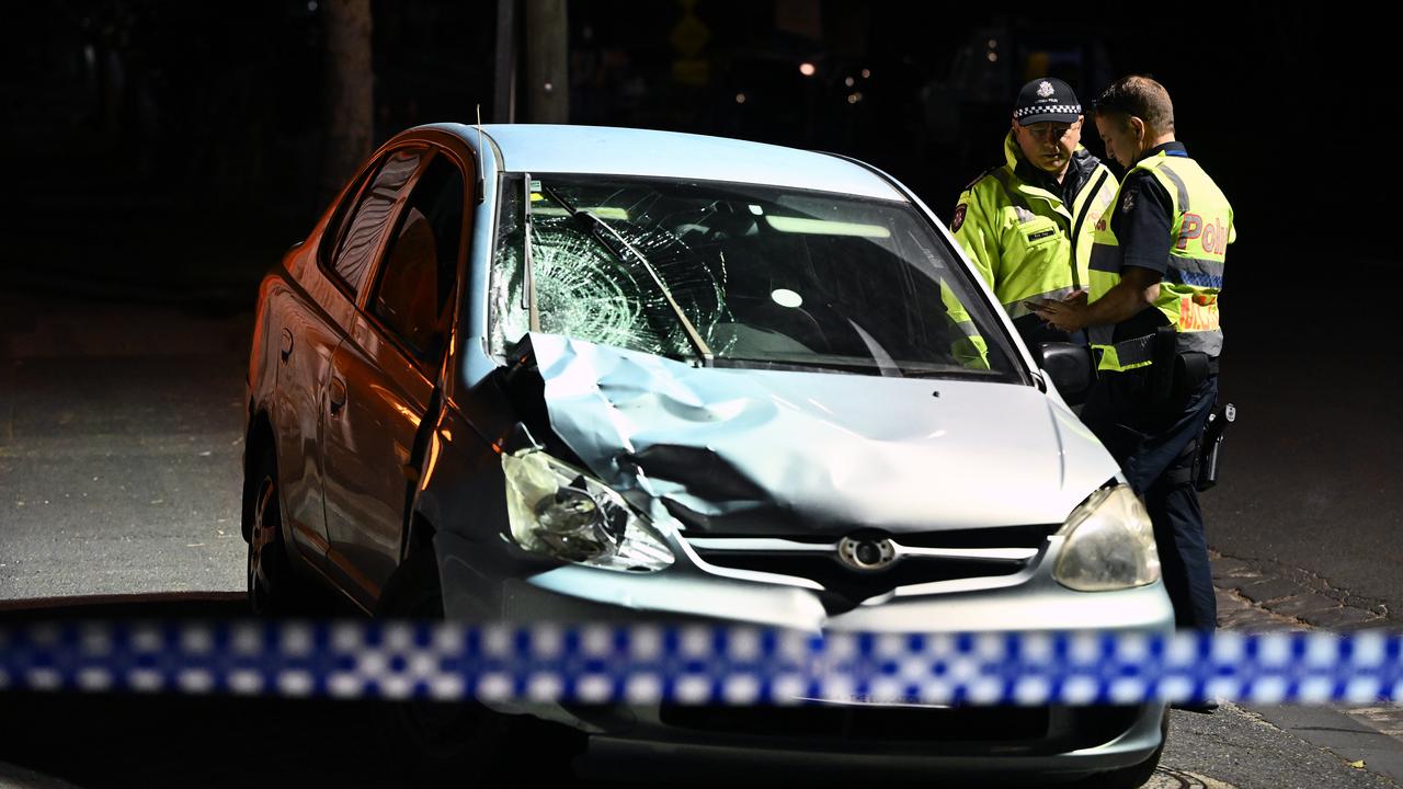 The scene where a car struck two pedestrians.