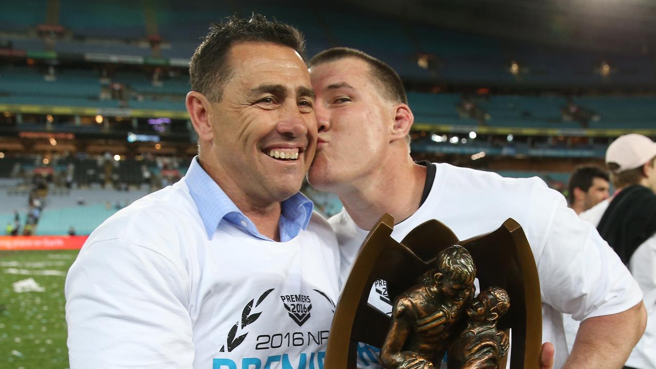 Shane Flanagan received a friendly peck from Paul Gallen
