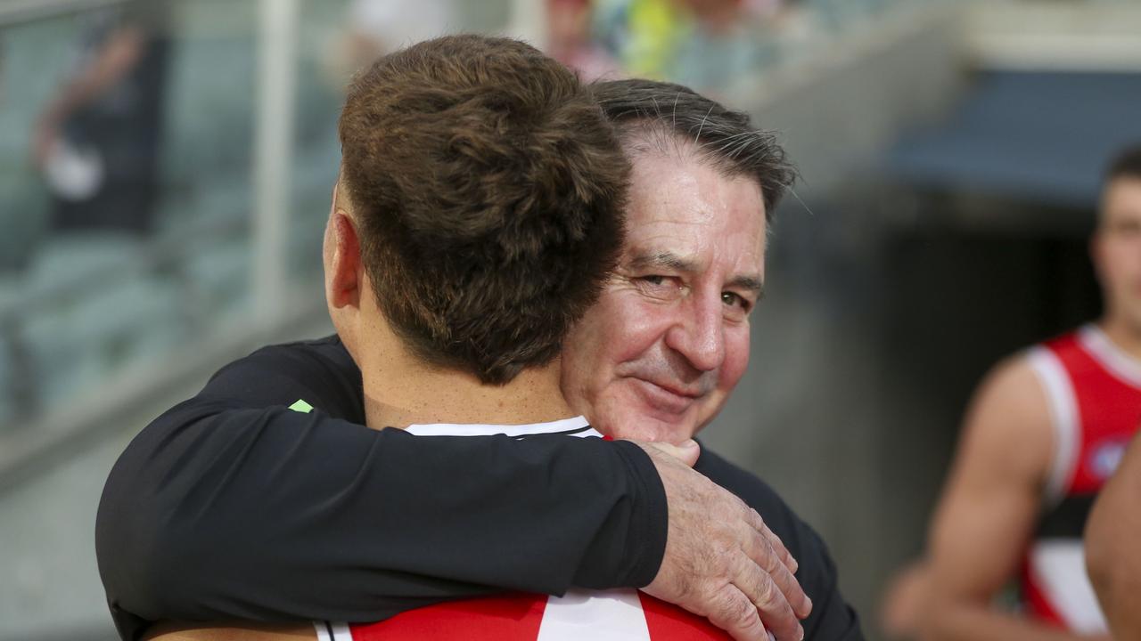 Coach Ross Lyon gave Lance Collard a hug