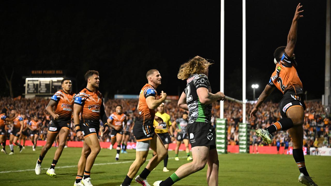 Wests Tigers' Sunia Turuva jumping for joy.