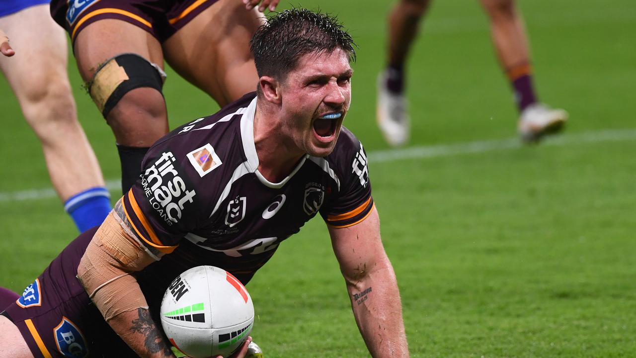 Cory Paix of the Broncos scores a try