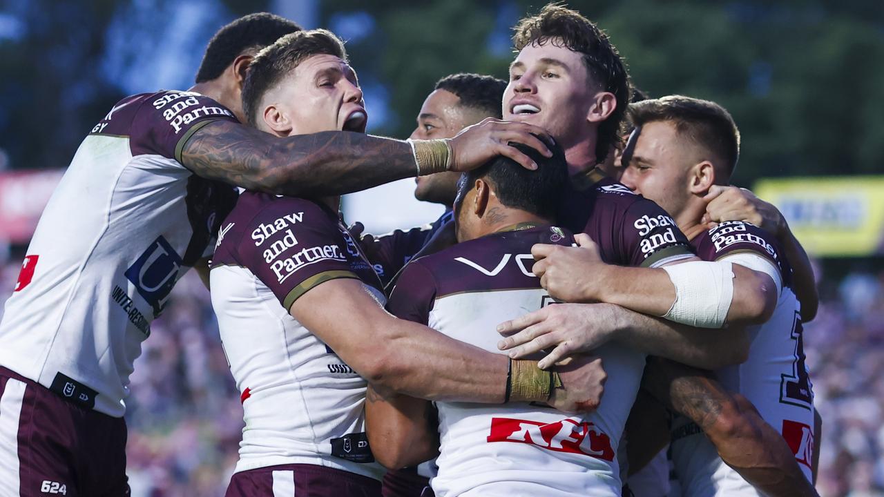 Sea Eagles celebrate.