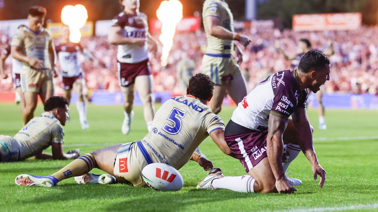 Jamal Fogarty of the Sea Eagles scores a try