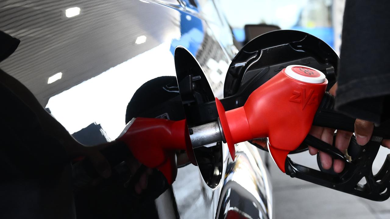Motorists fill up with discounted fuel.