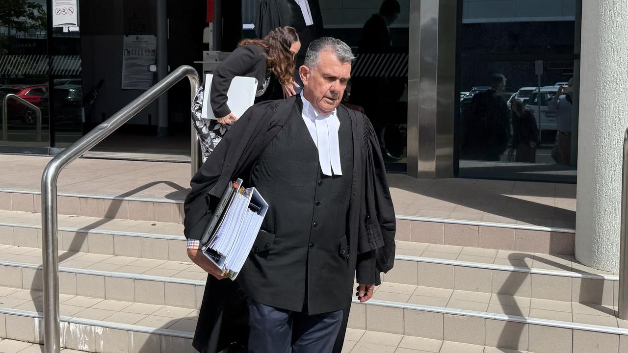 Barrister Simon Lewis (front) 