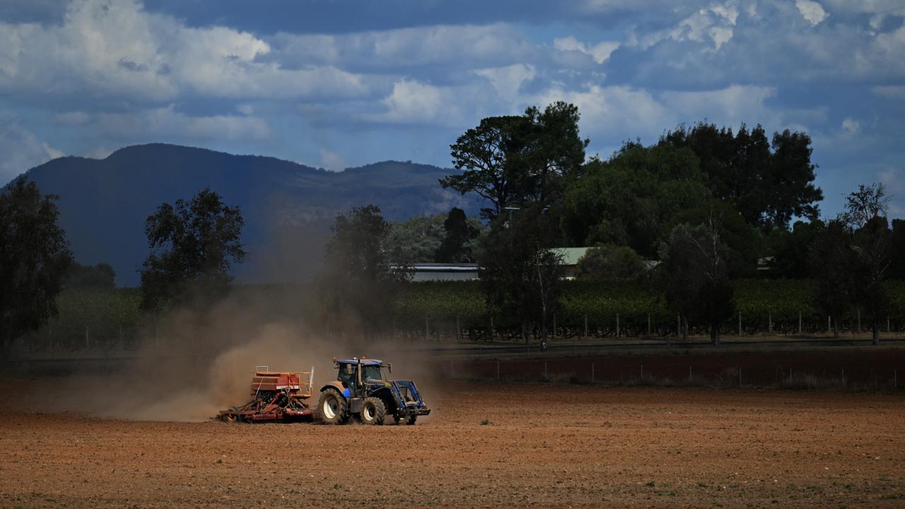 Tractor ploughing field