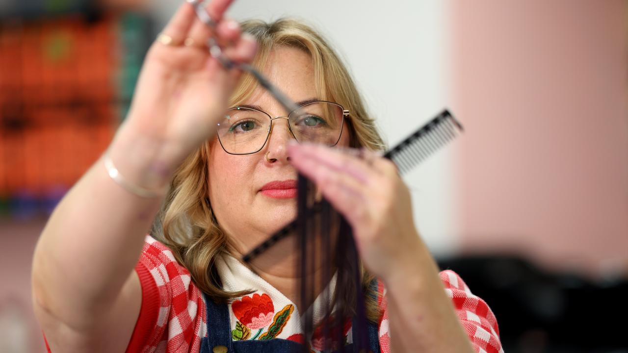 Katie Mitchell cuts hair