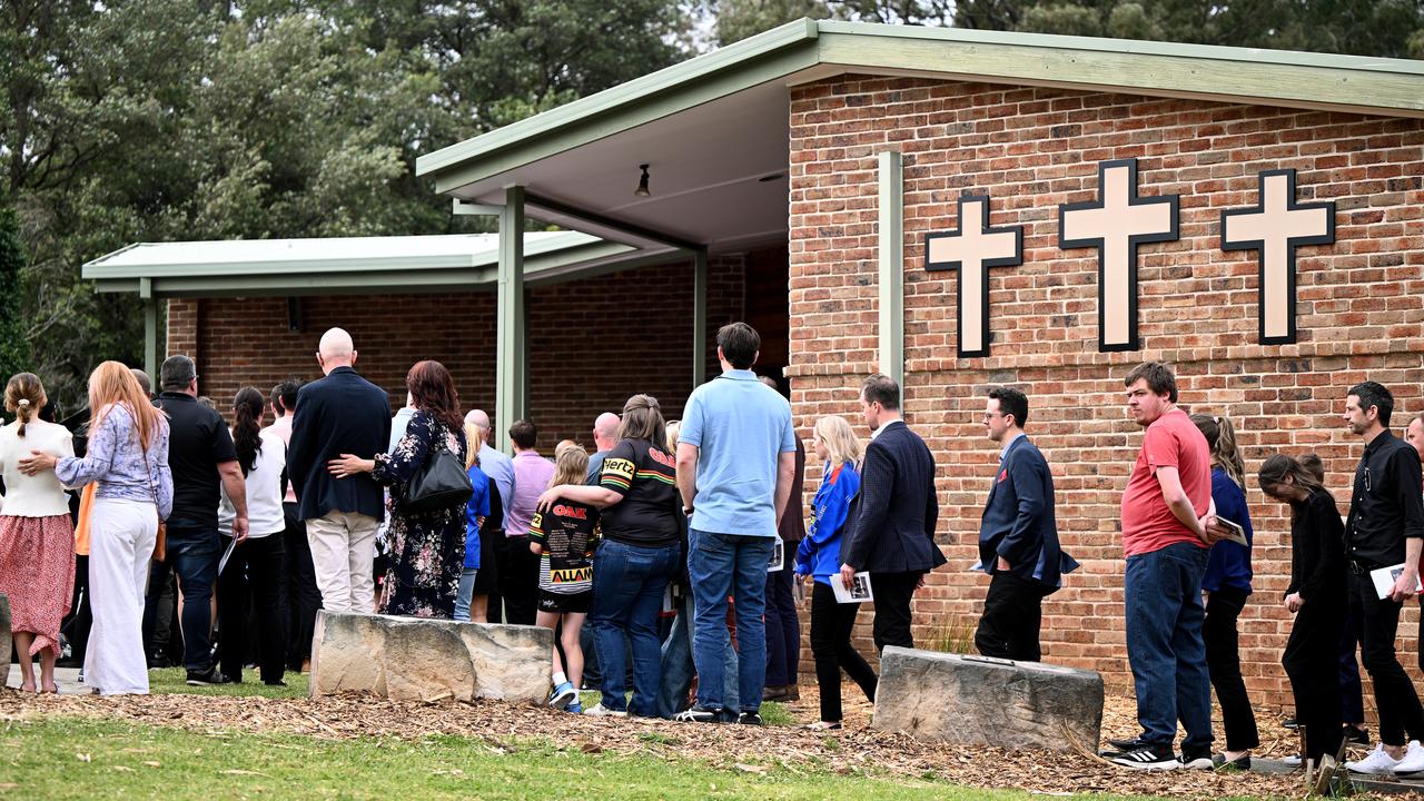 Mouners at the boys' funeral (file)