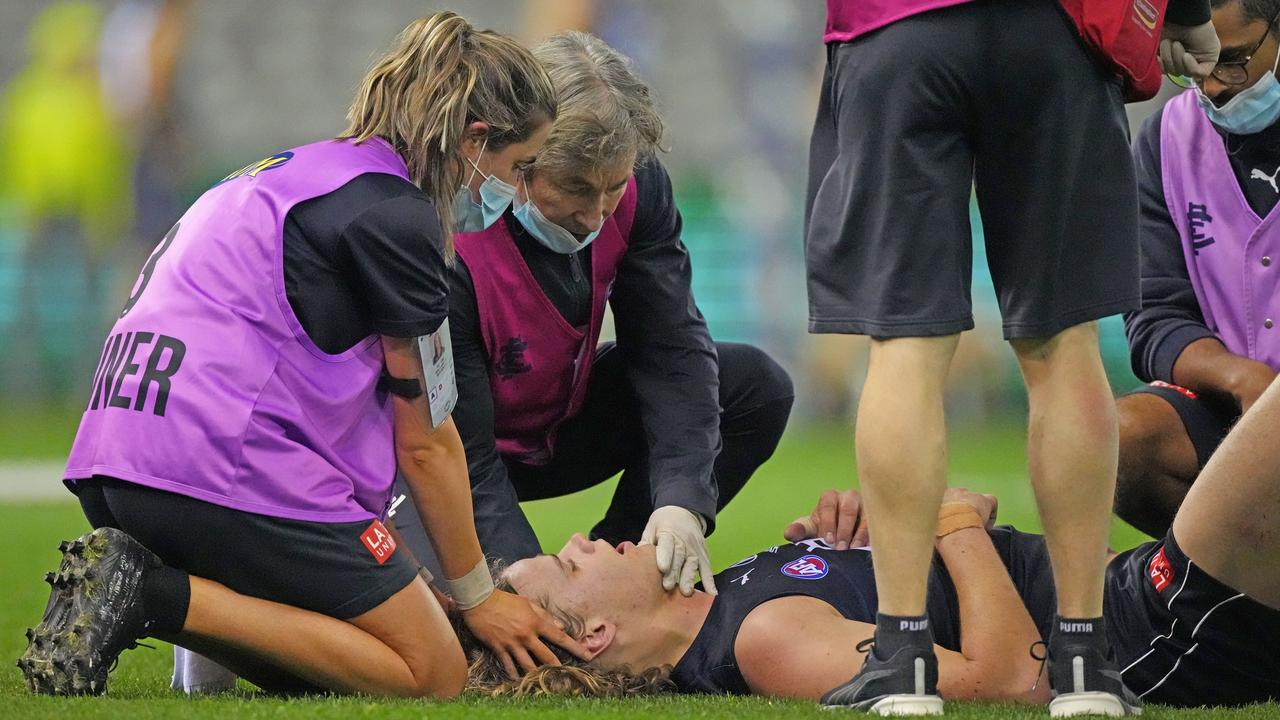 Tom De Koning of the Blues on the ground after being concussed