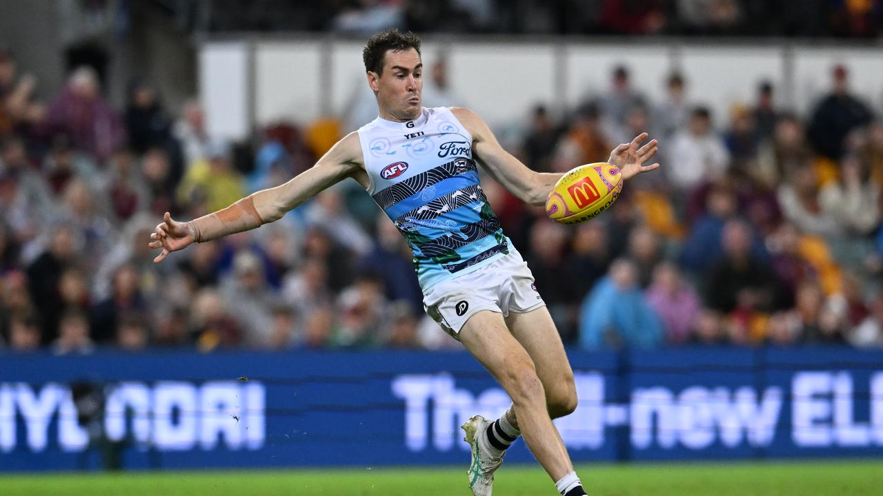 Jeremy Cameron of the Cats kicks a goal